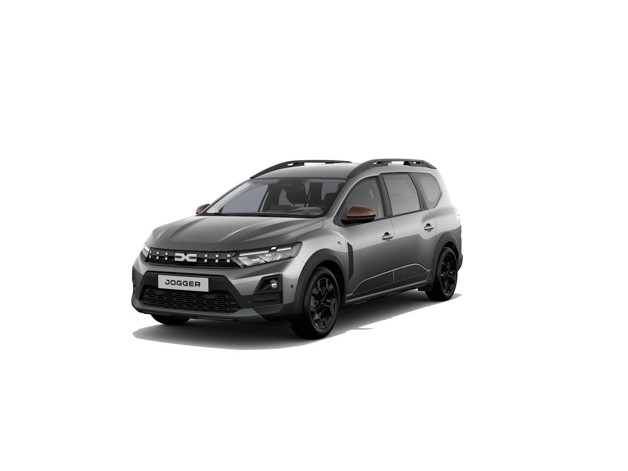 Dacia Jogger, ein geräumiger Familienvan in Grau mit schwarzem Grill, präsentiert sich frontal auf weißem Hintergrund.